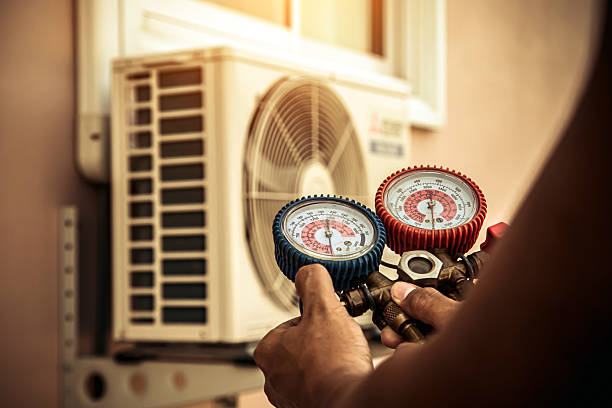 Professional Hvac technician working in Pfafftown, NC